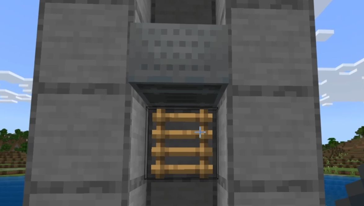 マイクラのトロッコ式エレベーター：はしご上にトロッコが落ちる様子