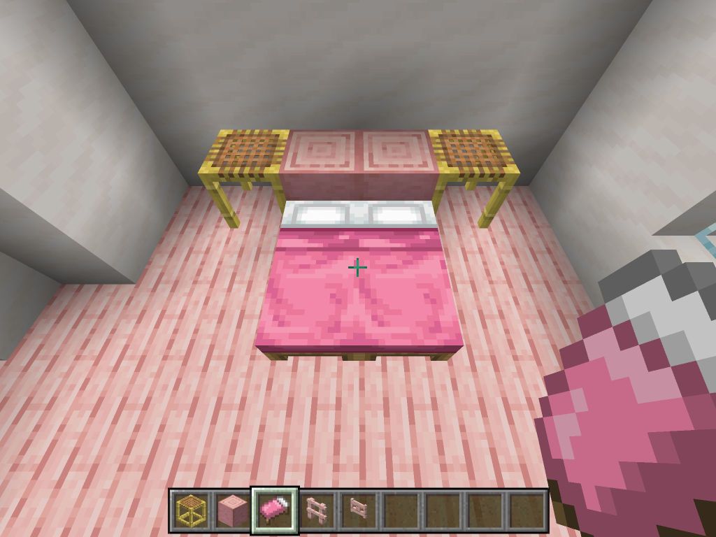 桃色のベッドを2つ設置