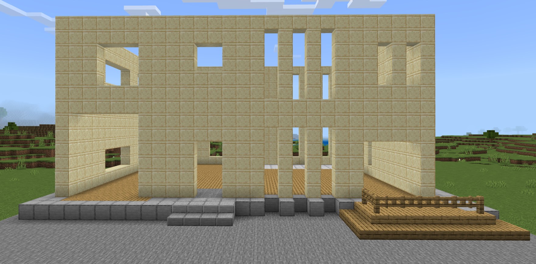 家の正面には高さ13×横27の「研がれた砂岩」を設置